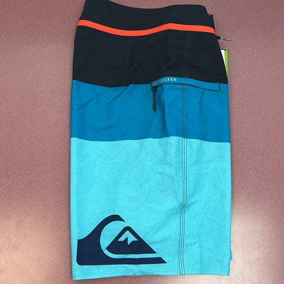 Quicksilver board shorts. Three shades of blue. Velcro & drawstring closure. NWT - Picture 3 of 8